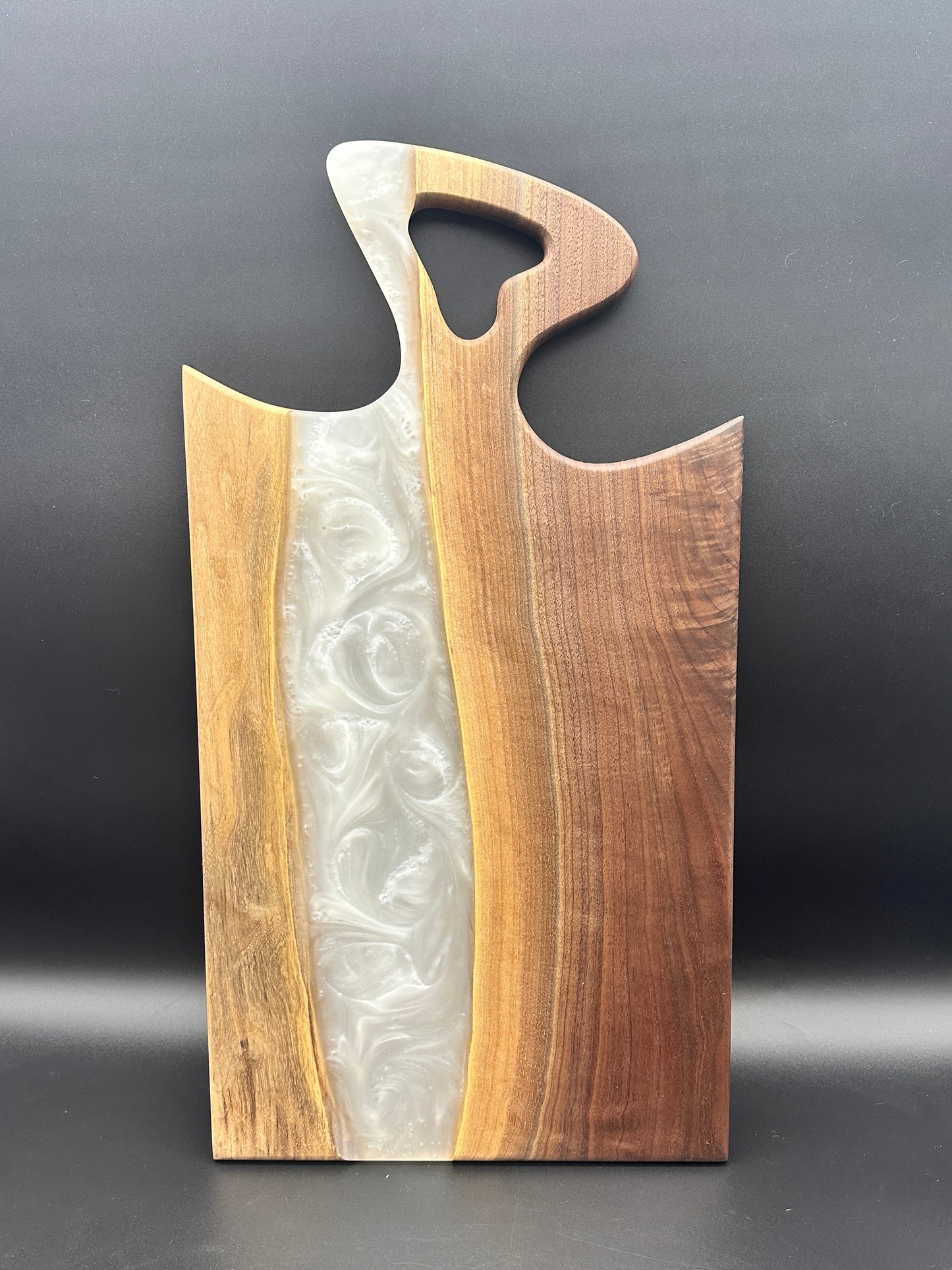 Walnut board with pearl white resin