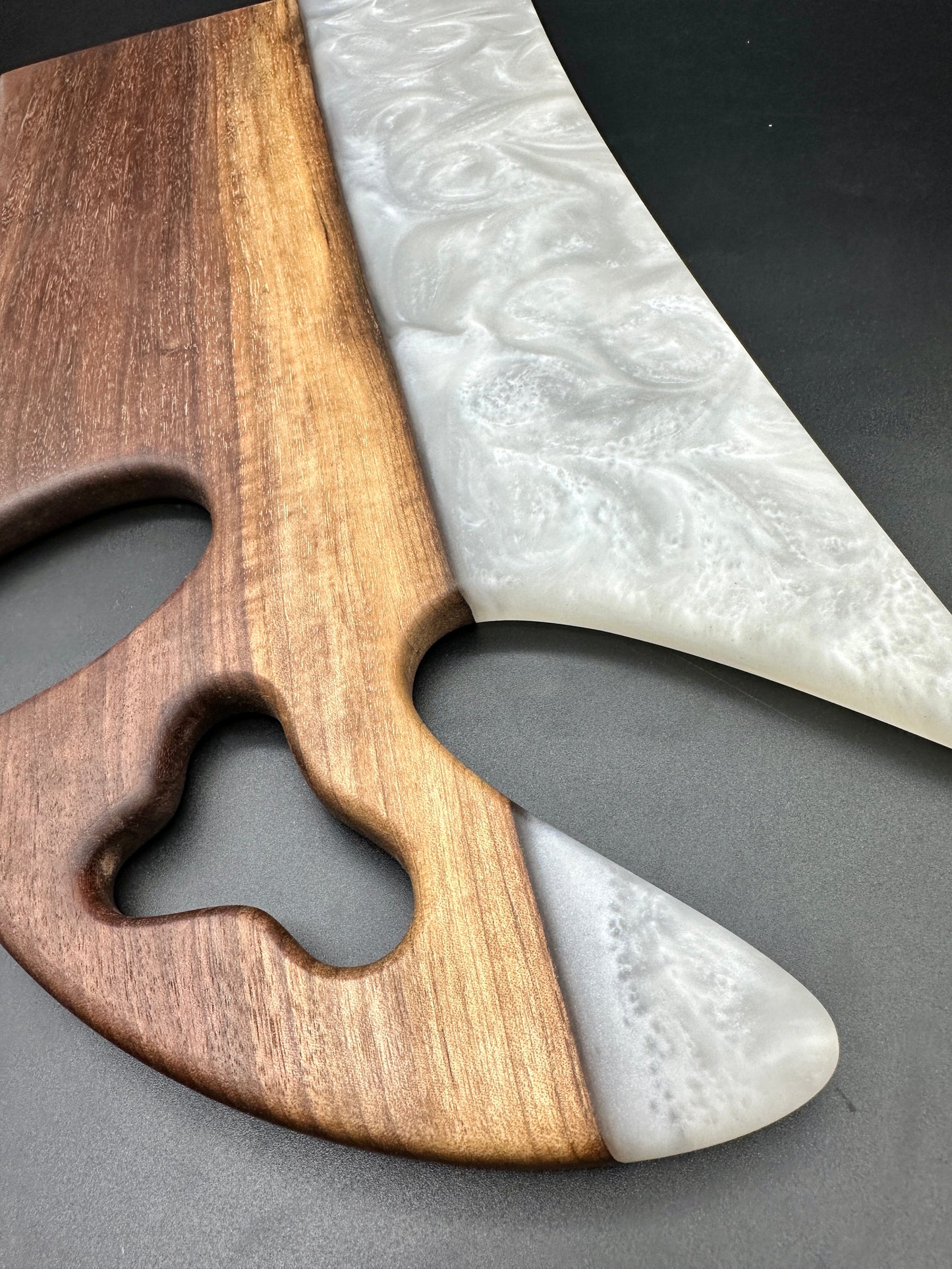 Walnut board with pearl white resin