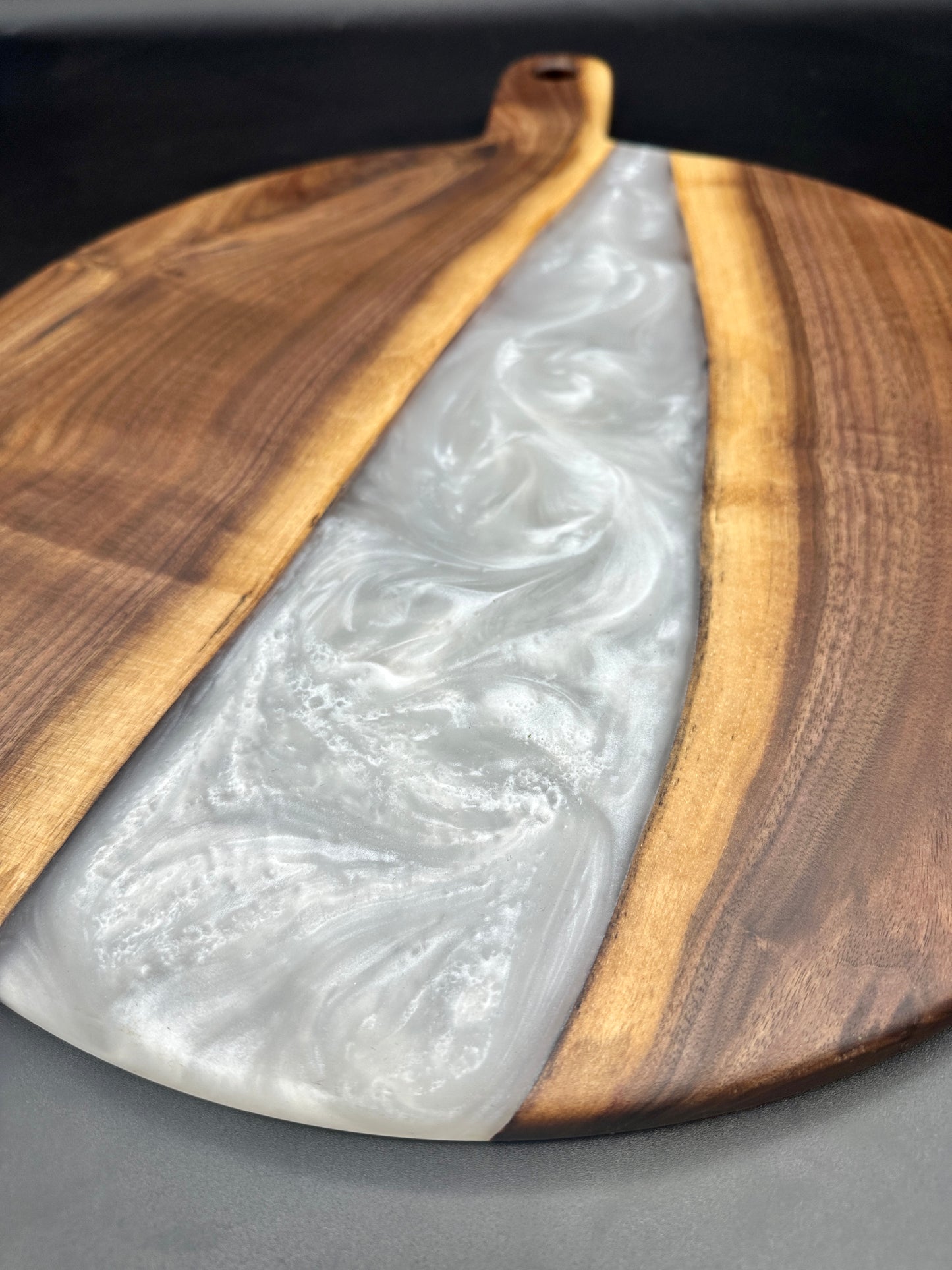 Large round walnut board with pearl white resin