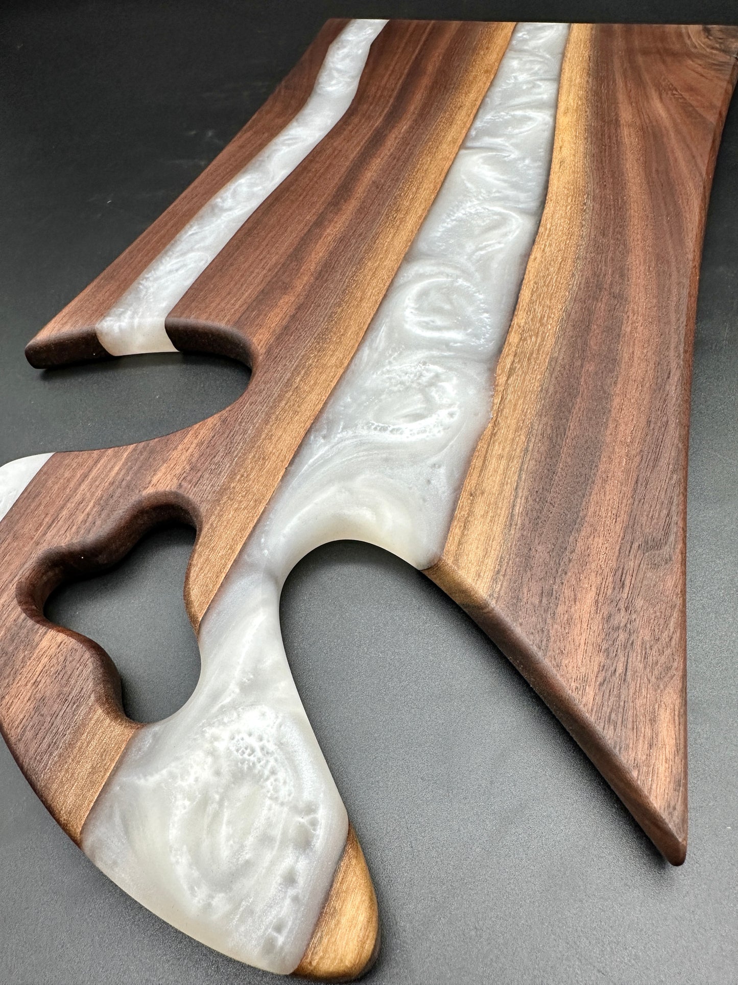 Walnut board with pearl white resin