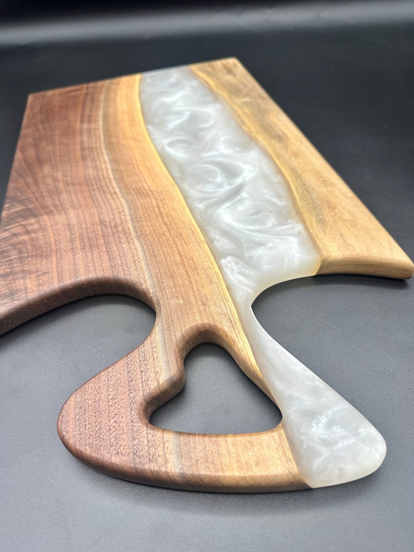 Walnut board with pearl white resin