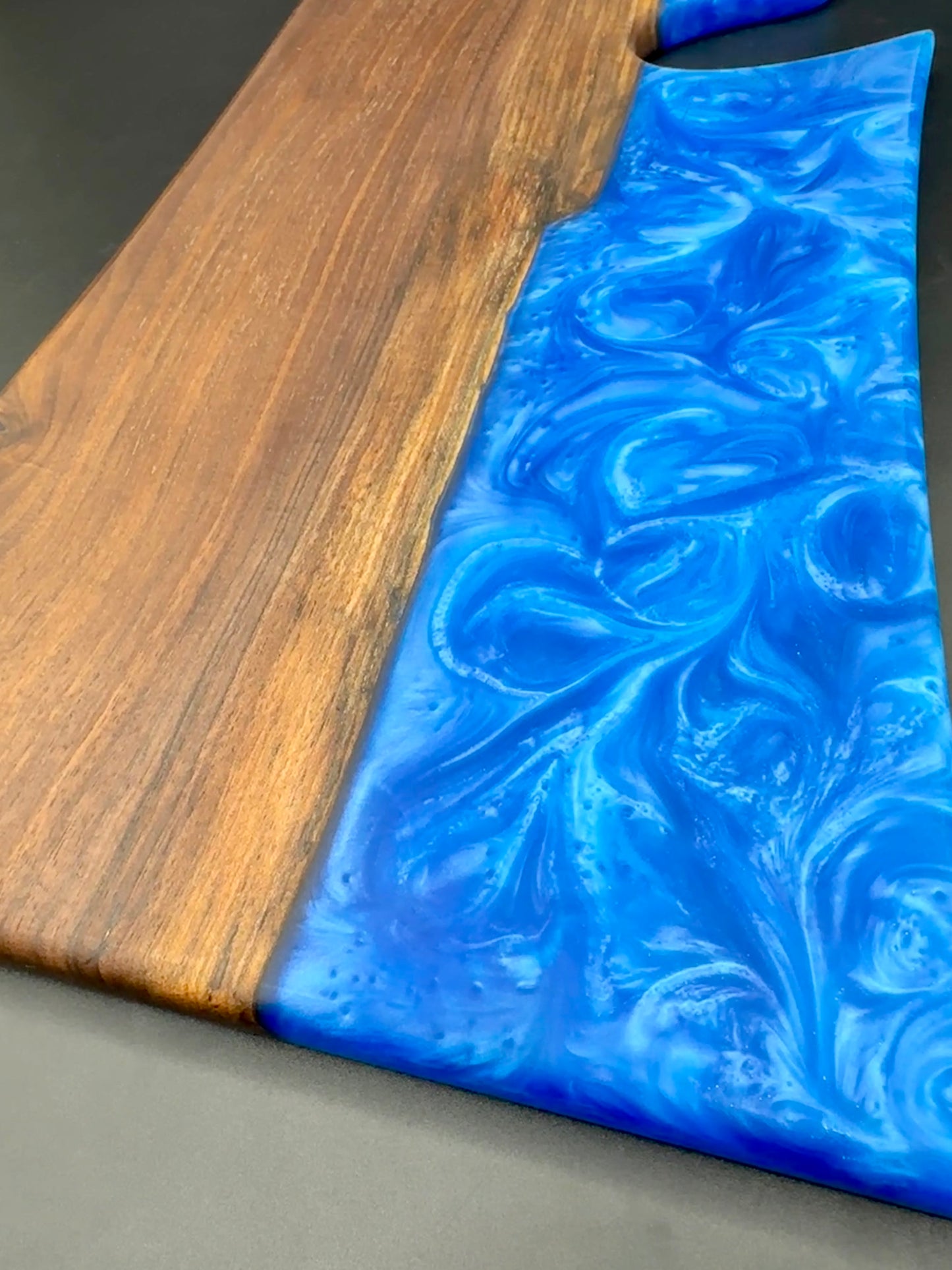 Walnut board with royal blue resin