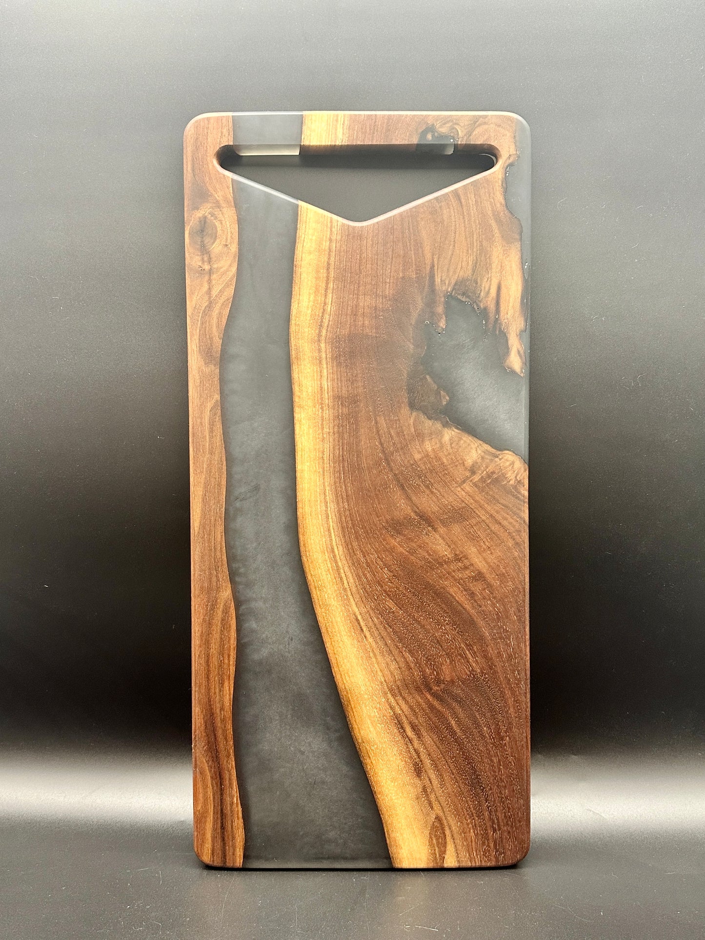 Walnut board with charcoal gray resin