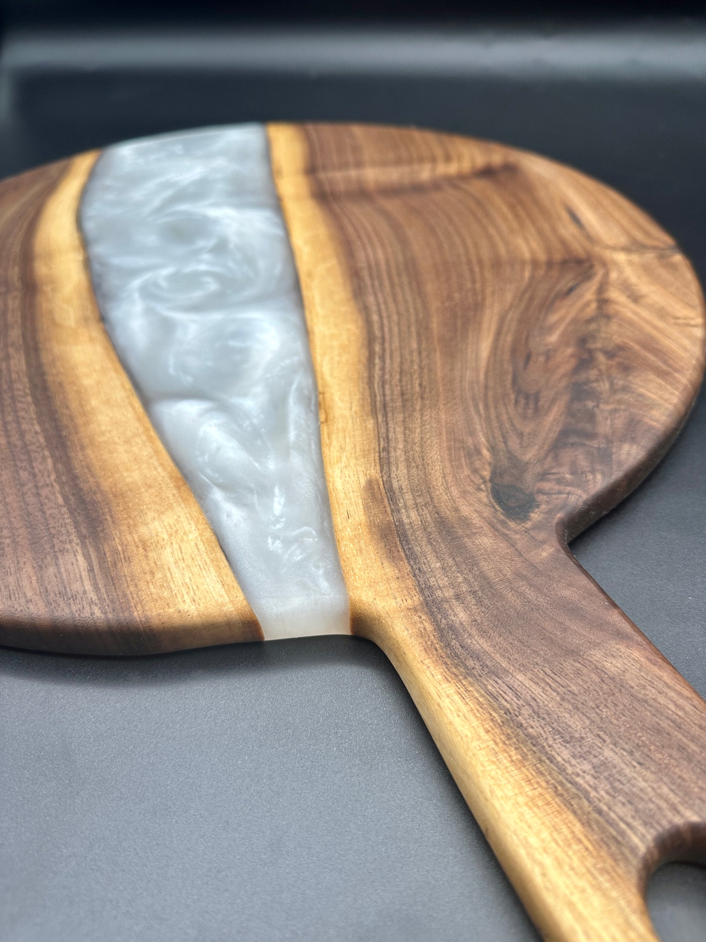 Large round walnut board with pearl white resin
