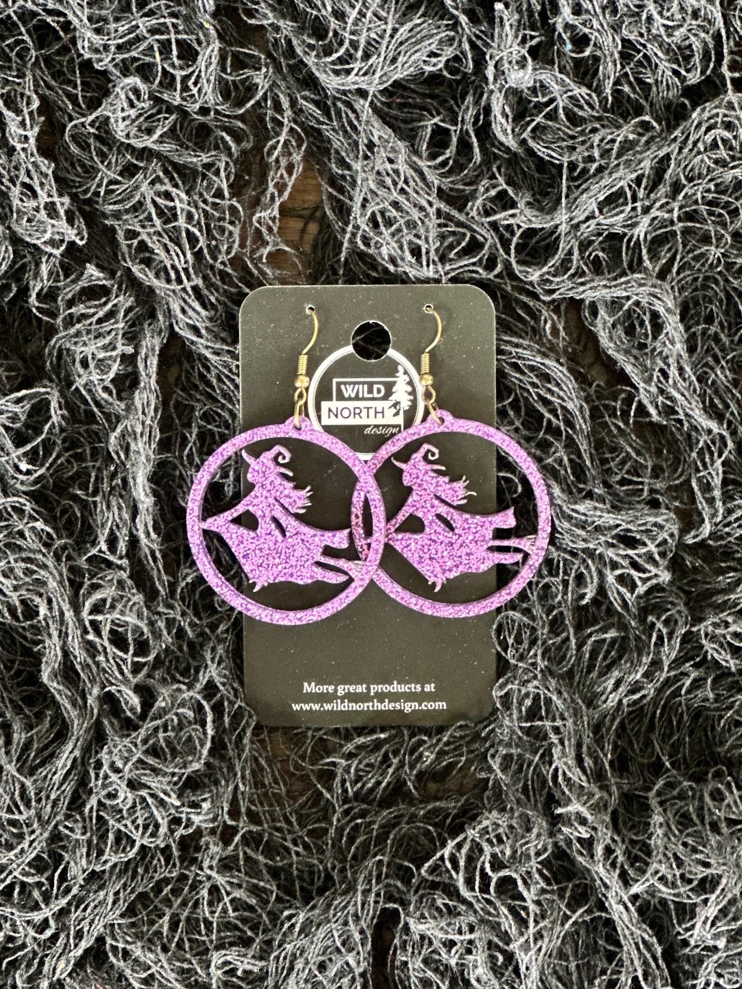 Witch on a broom Halloween earrings