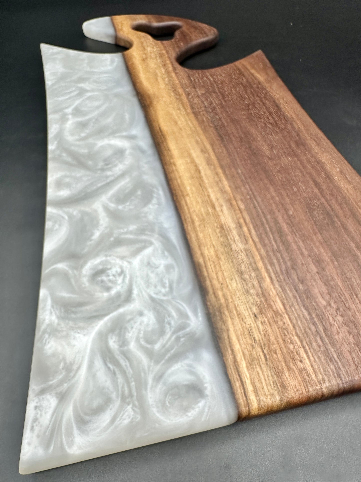 Walnut board with pearl white resin
