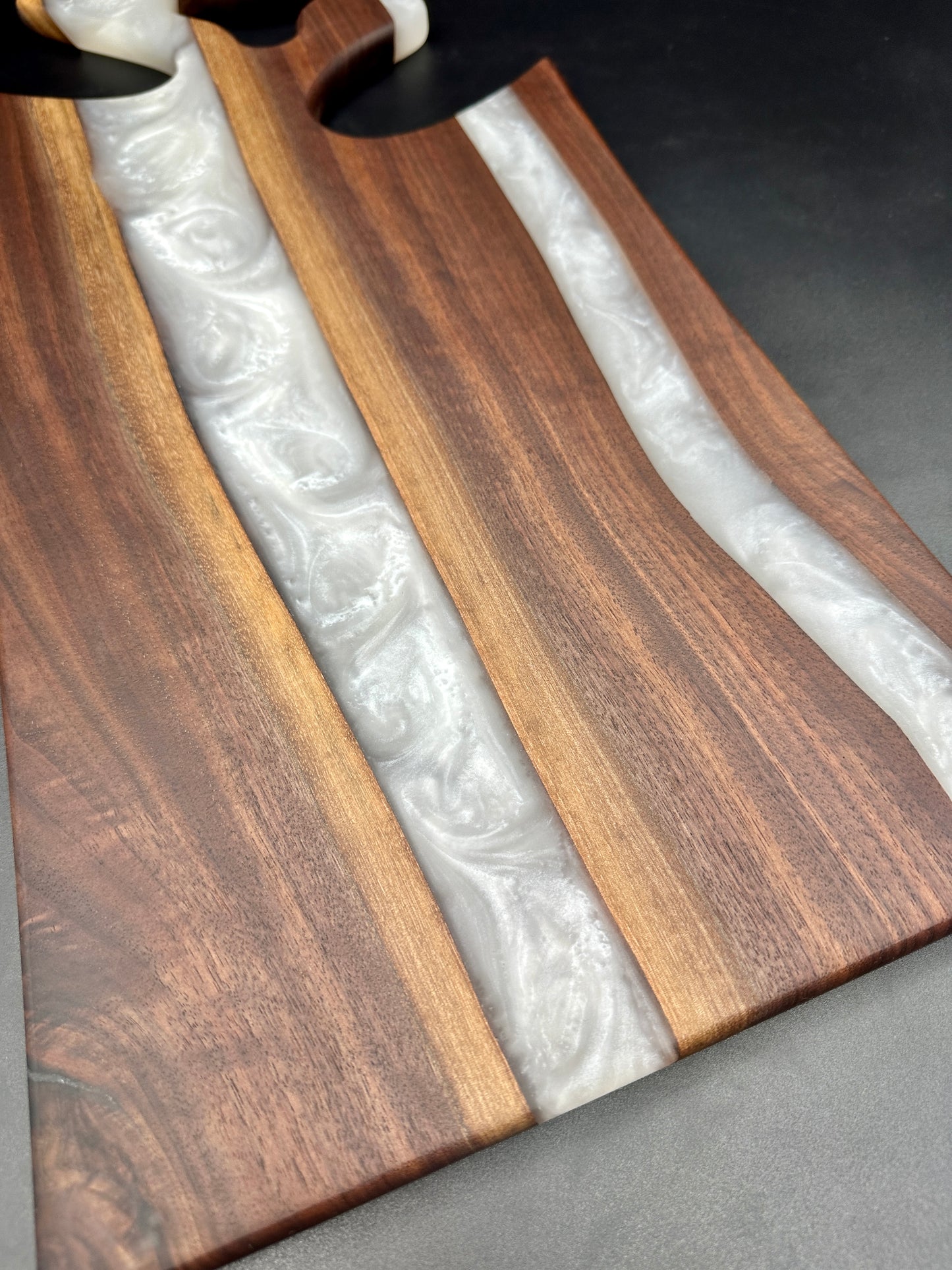 Walnut board with pearl white resin