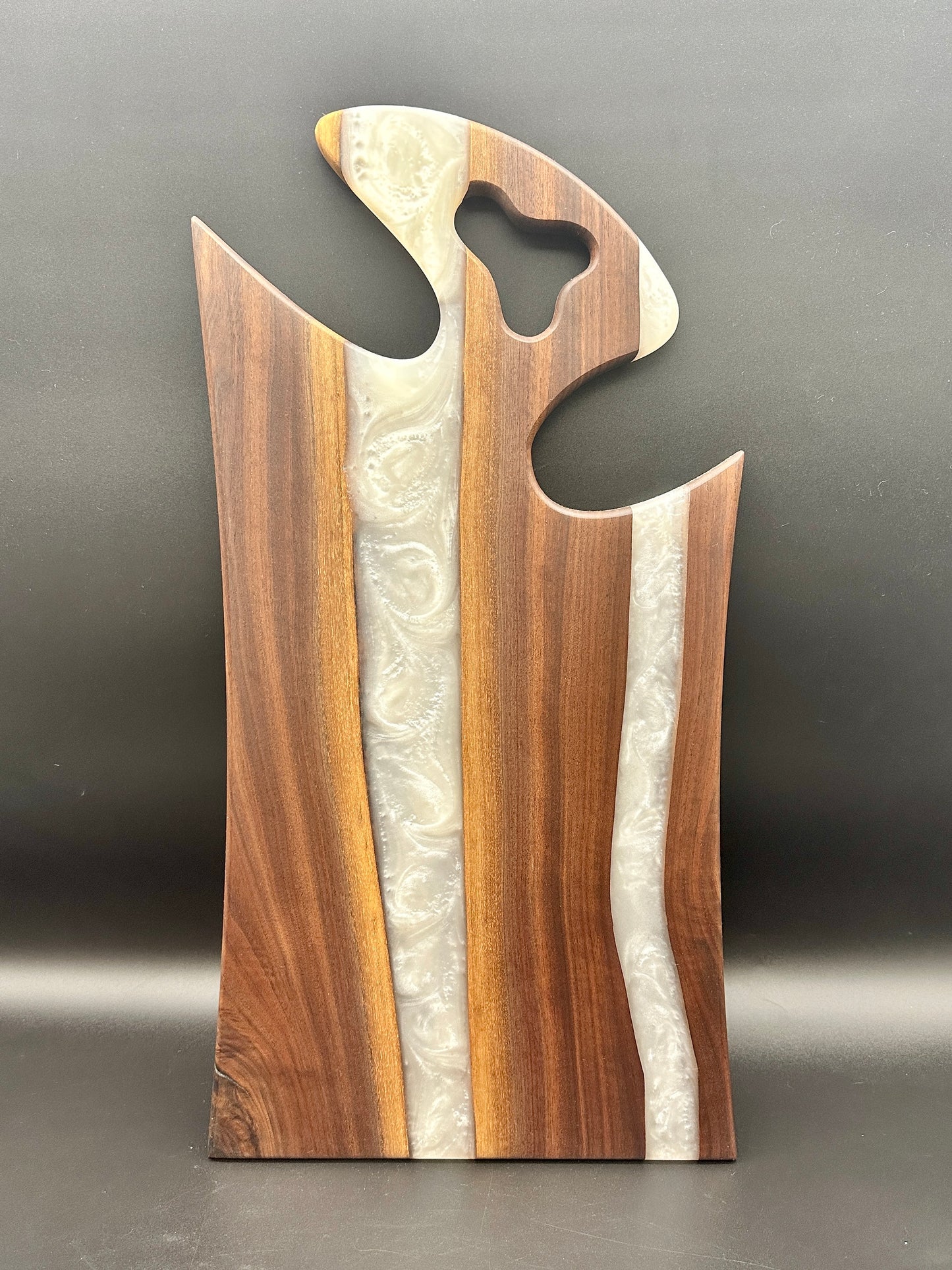 Walnut board with pearl white resin