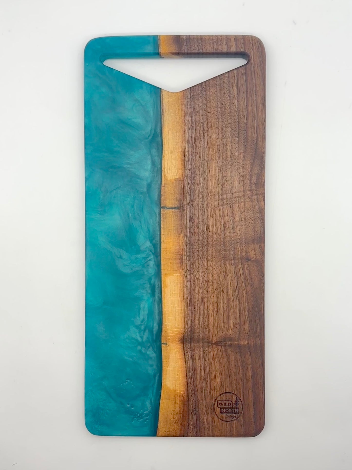 Walnut board with bora bora blue resin