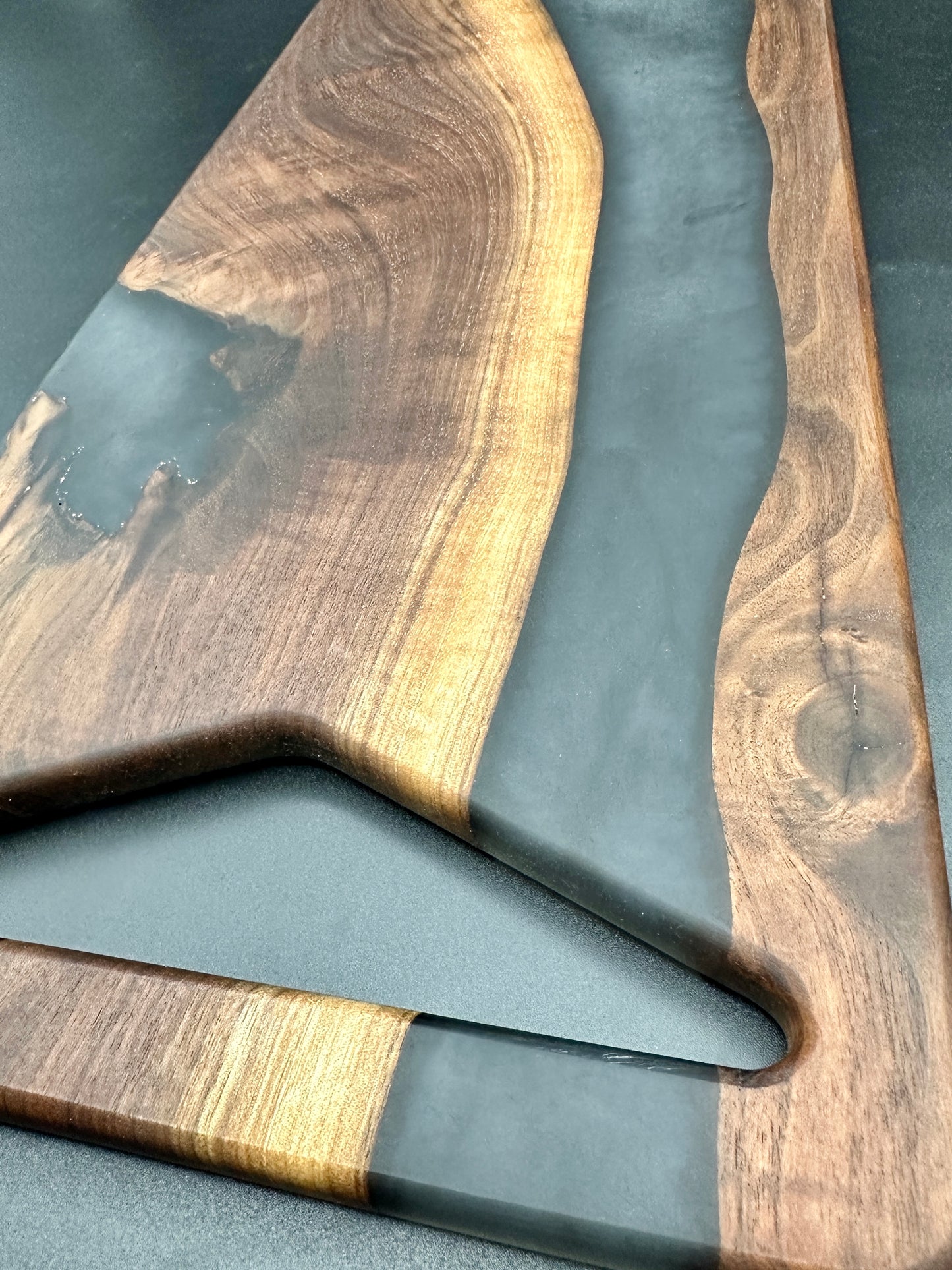 Walnut board with charcoal gray resin