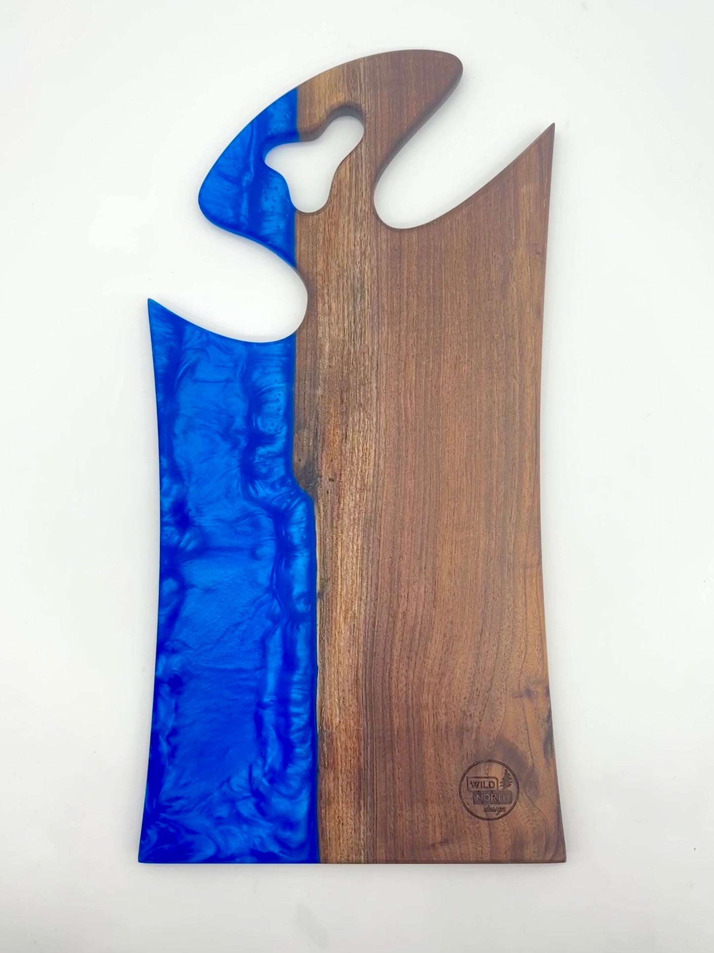 Walnut board with royal blue resin