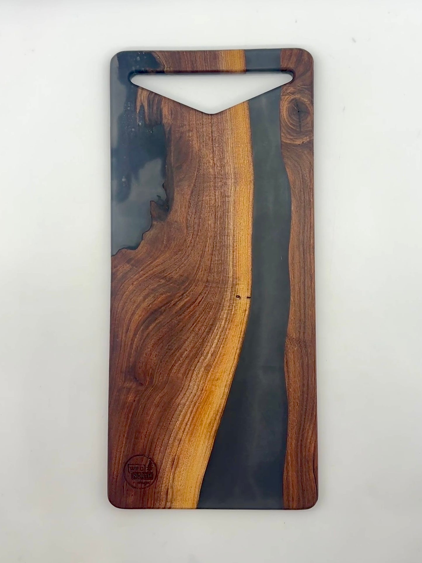 Walnut board with charcoal gray resin