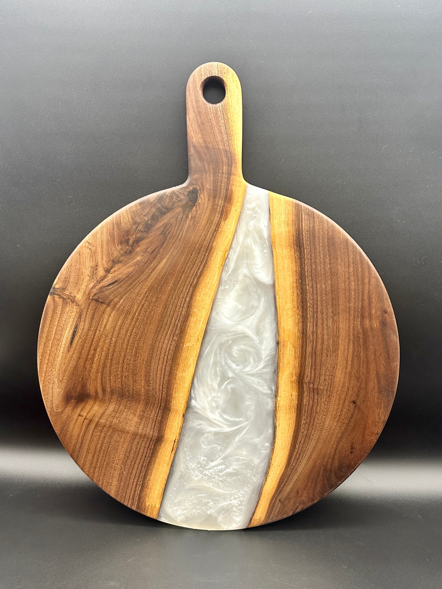 Large round walnut board with pearl white resin