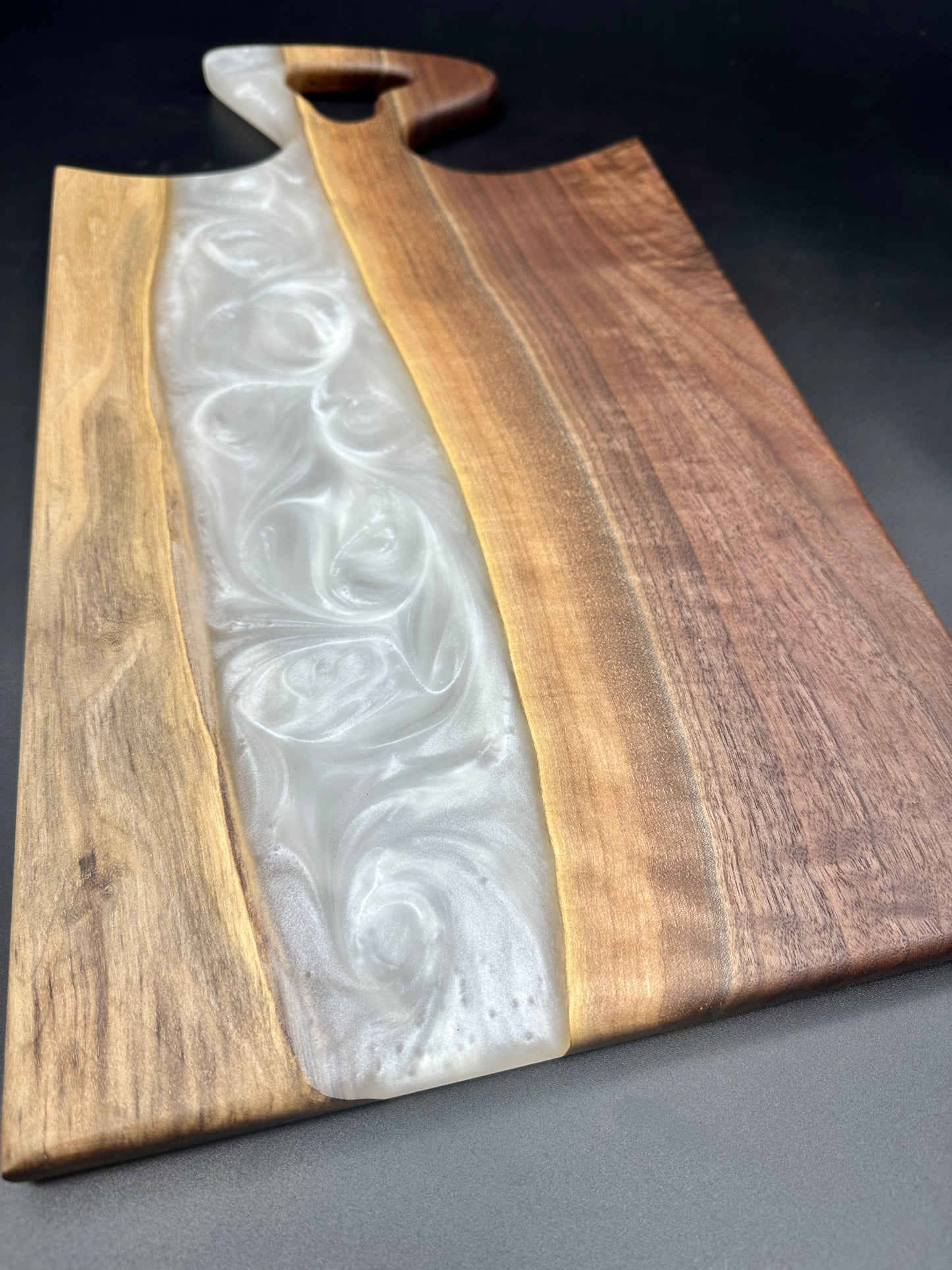 Walnut board with pearl white resin