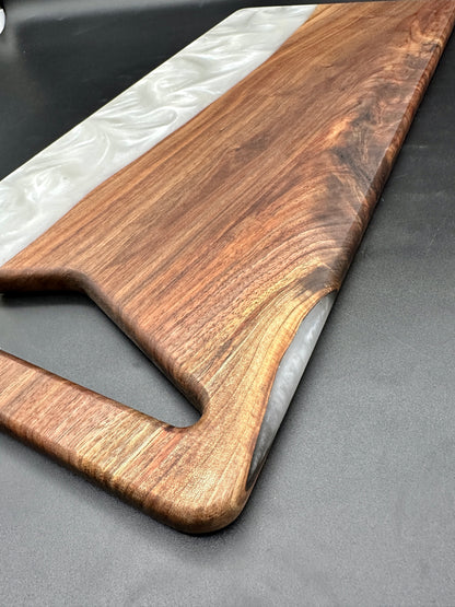 Walnut board with pearl white resin