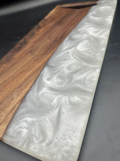 Walnut board with pearl white resin