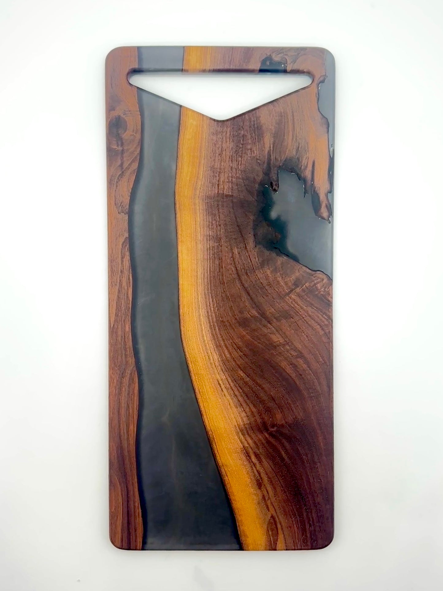 Walnut board with charcoal gray resin