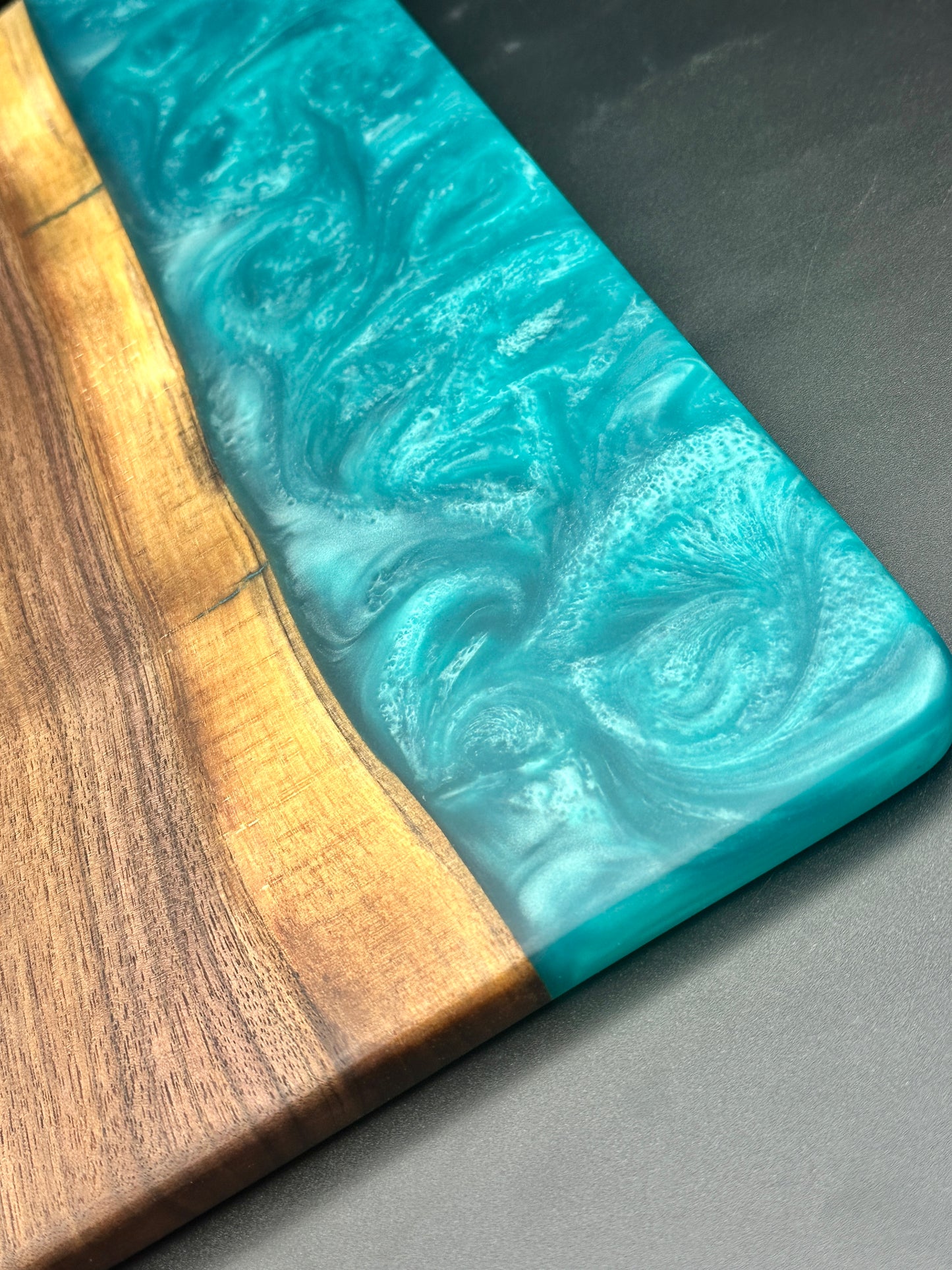 Walnut board with bora bora blue resin